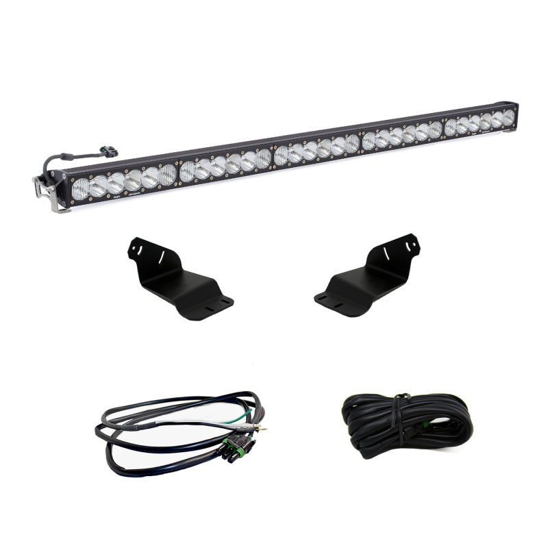 The Baja Designs 2021+ Ford Bronco Roof Light Bar Kit 50 Onx6+ w/Upfitter is displayed, featuring an LED light bar along with two mounting brackets and wiring harnesses, elegantly set against a plain white background. It's the perfect addition to elevate your Ford Bronco's lighting system.