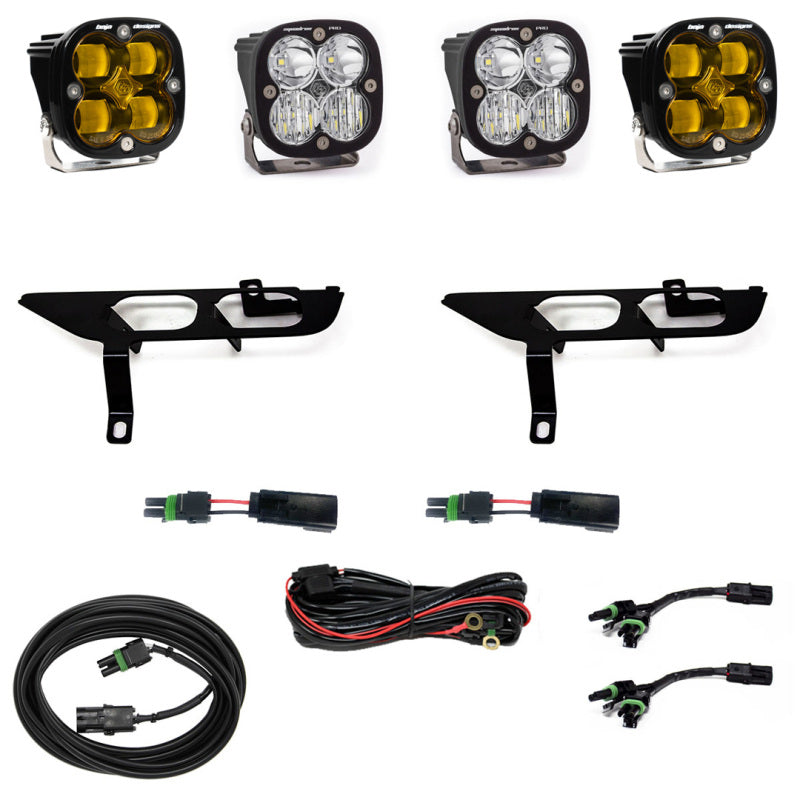 Baja Designs 2021+ Ford F-150 Pro Series Fog Pocket Kit - Amber: This off-road lighting kit includes three rectangular LED lights with amber lenses, ideal for your Ford F-150. The kit comes with mounting brackets, wiring harnesses, and connectors, all displayed on a white background.